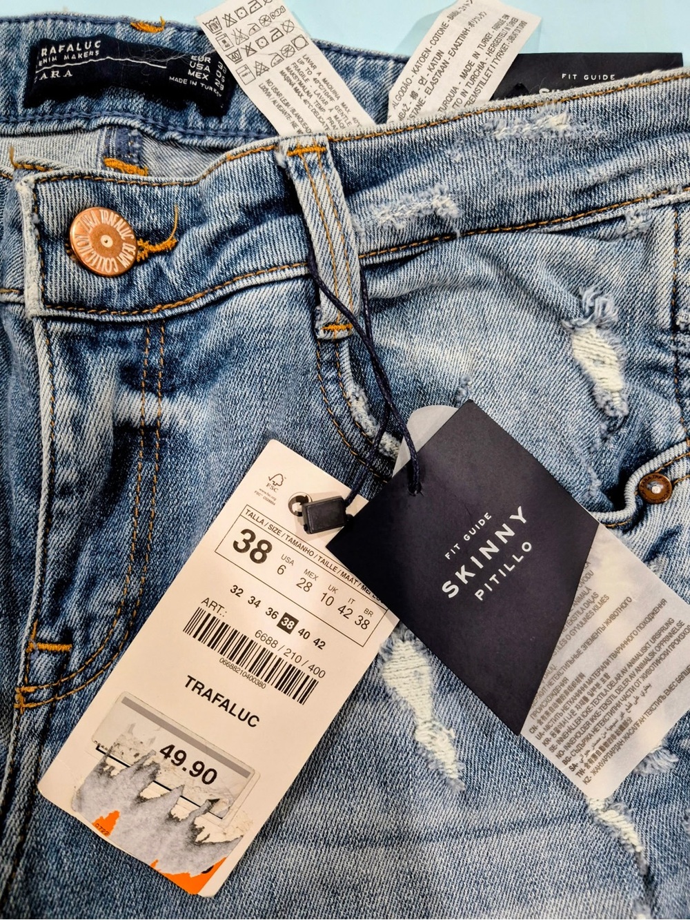Zara Skinny Jeans in Light Blue Denim with Distressing